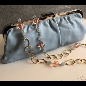 Soft blue leather clutch